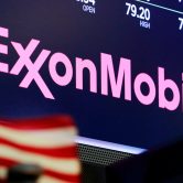 The Exxon Mobil logo is seen on a New York Stock Exchange screen