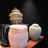 Several urns of various colors.