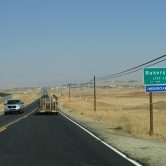 This photo shows the city limits sign for Bakersfield, California.