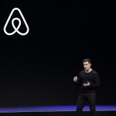 Airbnb co-founder and CEO Brian Chesky speaks during an event in San Francisco.