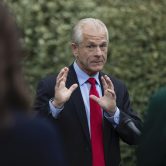 Peter Navarro speaks with reporters at the White House.