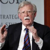 John Bolton gestures while speaking at an event in Washington.