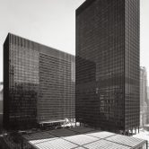 A black and white photo of the Dirksen Federal Building in Chicago.
