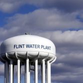 This photo shows the Flint Water Plant water tower.