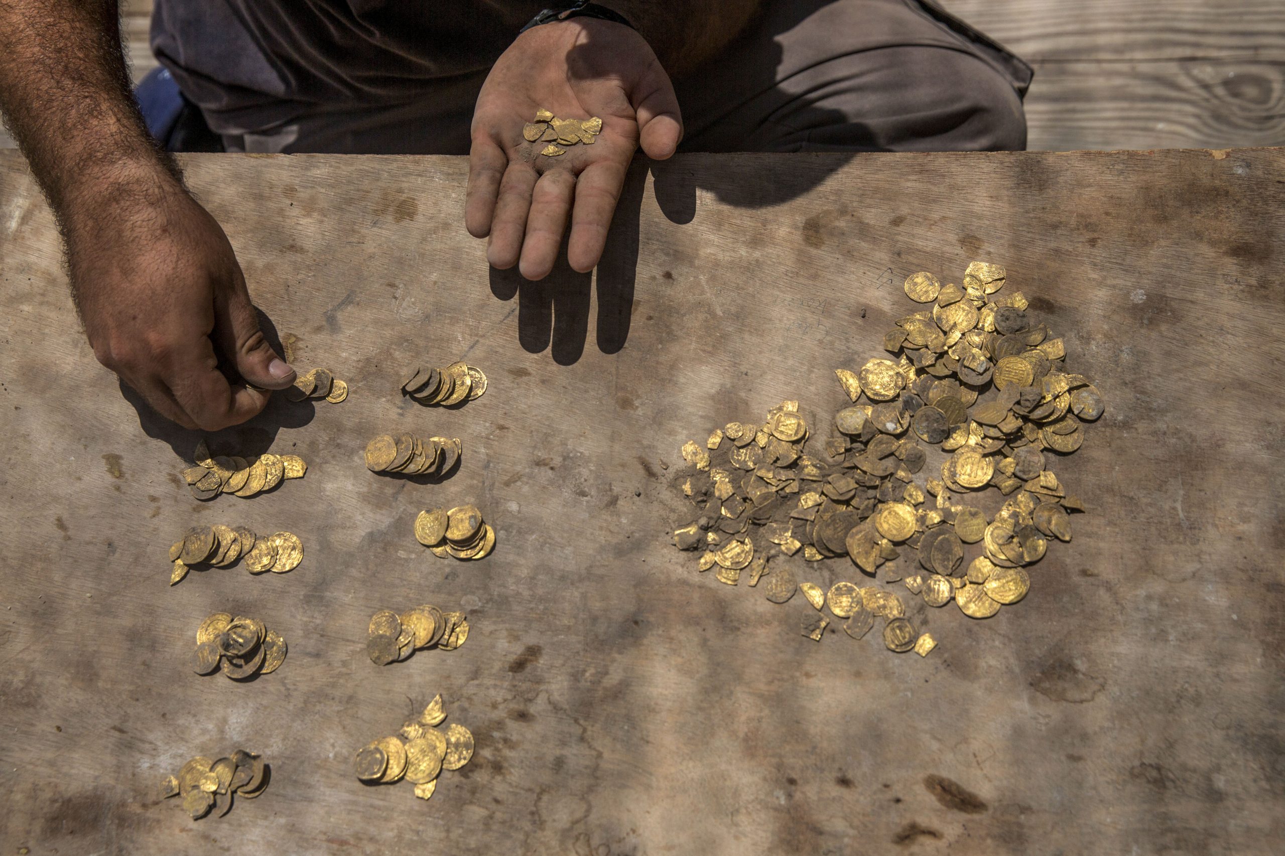 Israeli Dig Unearths Large Trove Of Early Islamic Gold Coins 