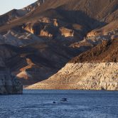 A speed boat traverses Lake Mead.