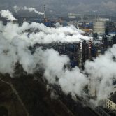 Smoke and steam rise from a coal processing plant in central China's Shanxi Province.