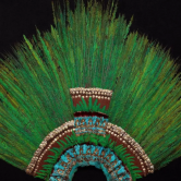 Aztec headdress made up of hundreds of long quetzal feathers.