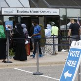 People wait in line to vote in Minnesota’s 2020 primary election