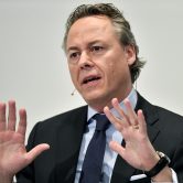 UBS CEO Ralph Hamers gestures during a press conference.