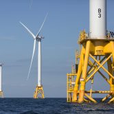 This photo shows an offshore wind farm.