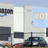 A banner encouraging workers to vote in labor balloting at an Amazon warehouse in Bessemer, Ala.