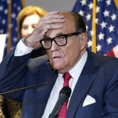 Rudy Giuliani speaks during a news conference at RNC headquarters.