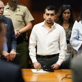 Cristhian Bahena Rivera stands in a courtroom