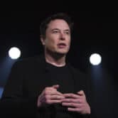 Elon Musk speaks before unveiling the Model Y at the company's design studio.