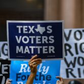 Voting rights activists rally at the Texas State Capitol
