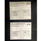 Two fake CDC vaccination cards