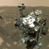 NASA's Perseverance rover and Ingenuity helicopter traverse Mars.