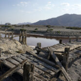 A dried-up former boating dock is seen along the Salton Sea