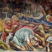 This photo shows a mural depicting sick people being treated.