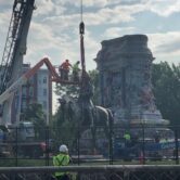 A statue of Robert E. Lee is removed in Richmond, Va.