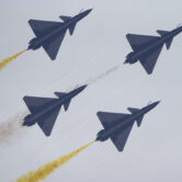 Members of China's “August 1st” Aerobatic Team perform during an exhibition.