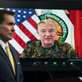 Gen. Frank McKenzie appears on screen as he speaks from MacDill Air Force Base, in Tampa, Fla.