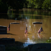 Headstones at a cemetery that flooded are seen in Somerville, N.J.
