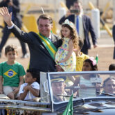 Brazilian President Jair Bolsonaro arrives for a flag-raising ceremony in Brasilia, Brazil.