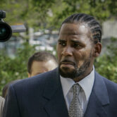 This 2008 photo shows R. Kelly arriving for the first day of jury selection in his child pornography trial.