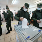 Russian Army soldiers cast their ballots at a polling station outside St. Petersburg.