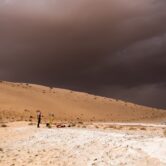 A storm arrives during archaeological excavation in Saudi Arabia