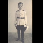 Child in royal uniform