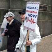 Two anti-vaccine protestors