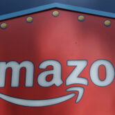 An Amazon logo is seen atop the Amazon Treasure Truck The Park DTLA office complex in Los Angeles.
