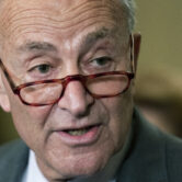 Chuck Schumer speaks to reporters on Capitol Hill in Washington.