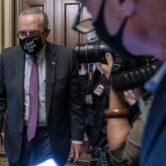 Chuck Schumer leaves a Senate Democratic meeting at the Capitol.