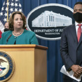 Lisa Monaco and Kenneth Polite Jr. at a news conference.