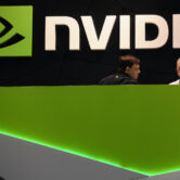 People gather in the Nvidia booth at the Mobile World Congress.