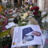 Floral tributes mark the spot where journalist Peter R. de Vries was shot in Amsterdam, Netherlands.