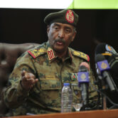 Gen. Abdel-Fattah Burhan speaks during a press conference in Sudan.