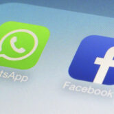 This photo shows the WhatsApp and Facebook app icons on a smartphone.