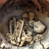 Bones of two individuals housed in clay pot
