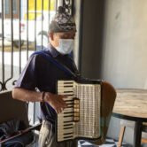 Max Cruz plays the accordion in Oaxacan restaurant