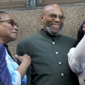 Muhammad Aziz smiles after being exonerated