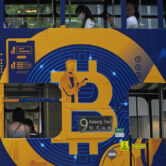 This photo shows a Bitcoin ad on a tram in Hong Kong.