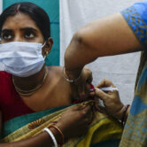 A health worker administers a dose of the Covaxin Covid-19 vaccine in India.