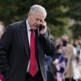 Former White House Chief of Staff Mark Meadows talks on a phone