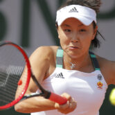 China's Shuai Peng plays a shot during a French Open tennis match.