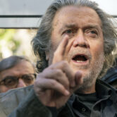 Steve Bannon speaks with reporters after departing federal court.